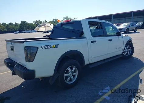 2014 Nissan Titan Pro-4X z USA, uszkodzony, nr VIN 1N6BA0EC3EN504087